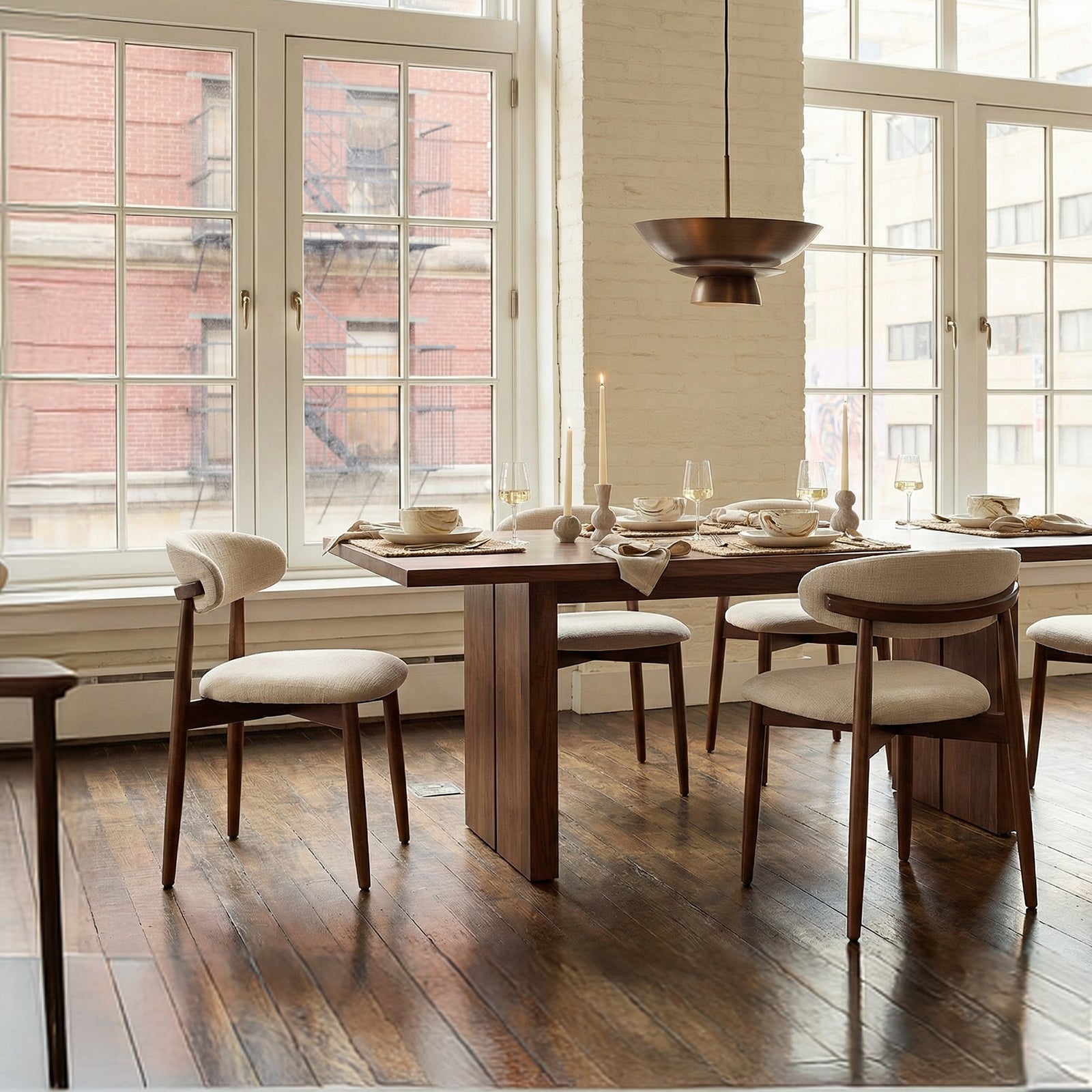 COLAMY NOYA beige upholstered dining chairs around a wooden table in a stylish dining room