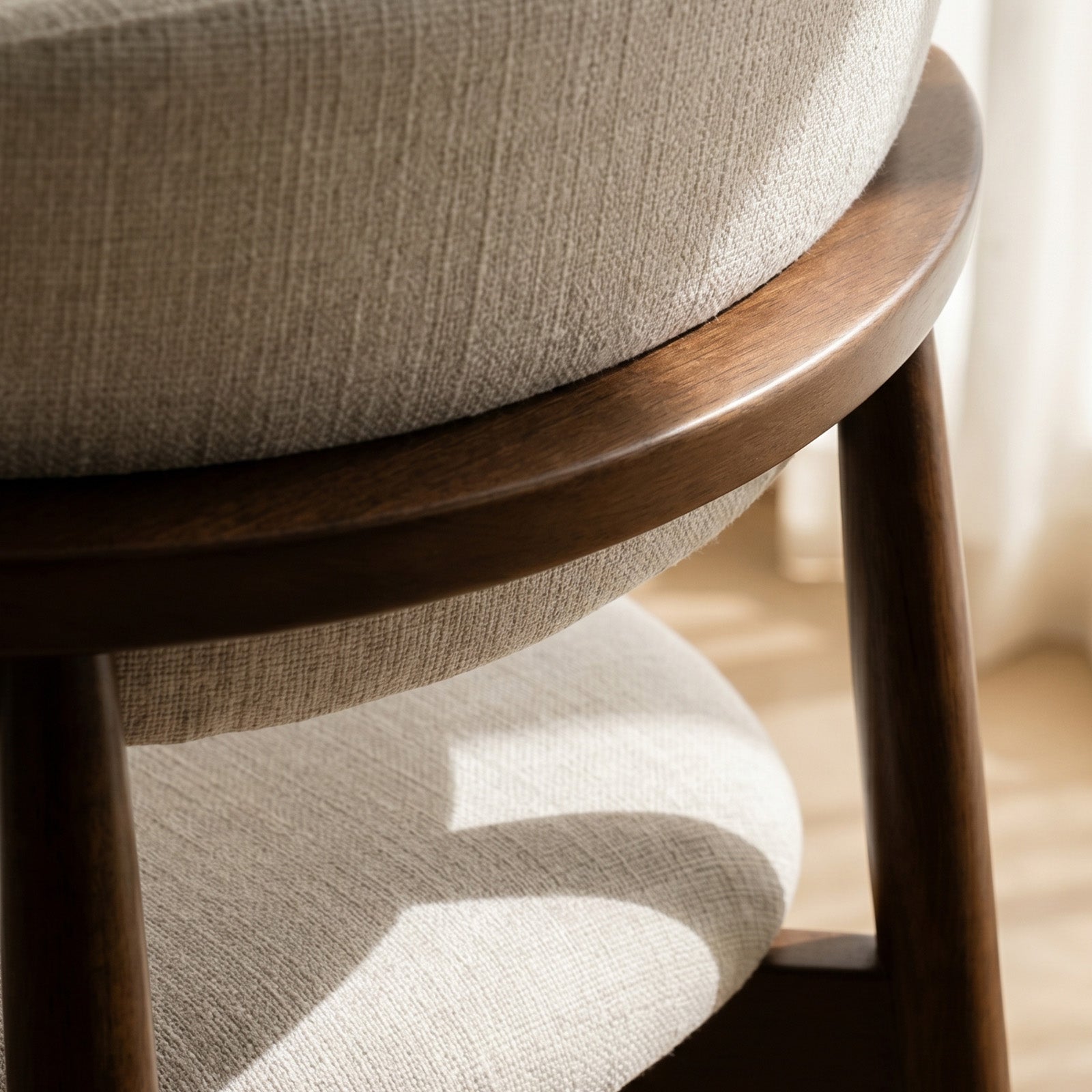 Close-up of Colamy upholstered Bar Stool with wooden frame and beige cushioned seat