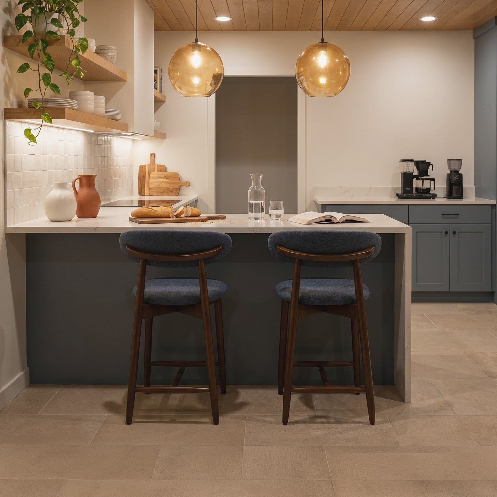 Modern kitchen with Colamy upholstered bar stools, and various kitchen items.